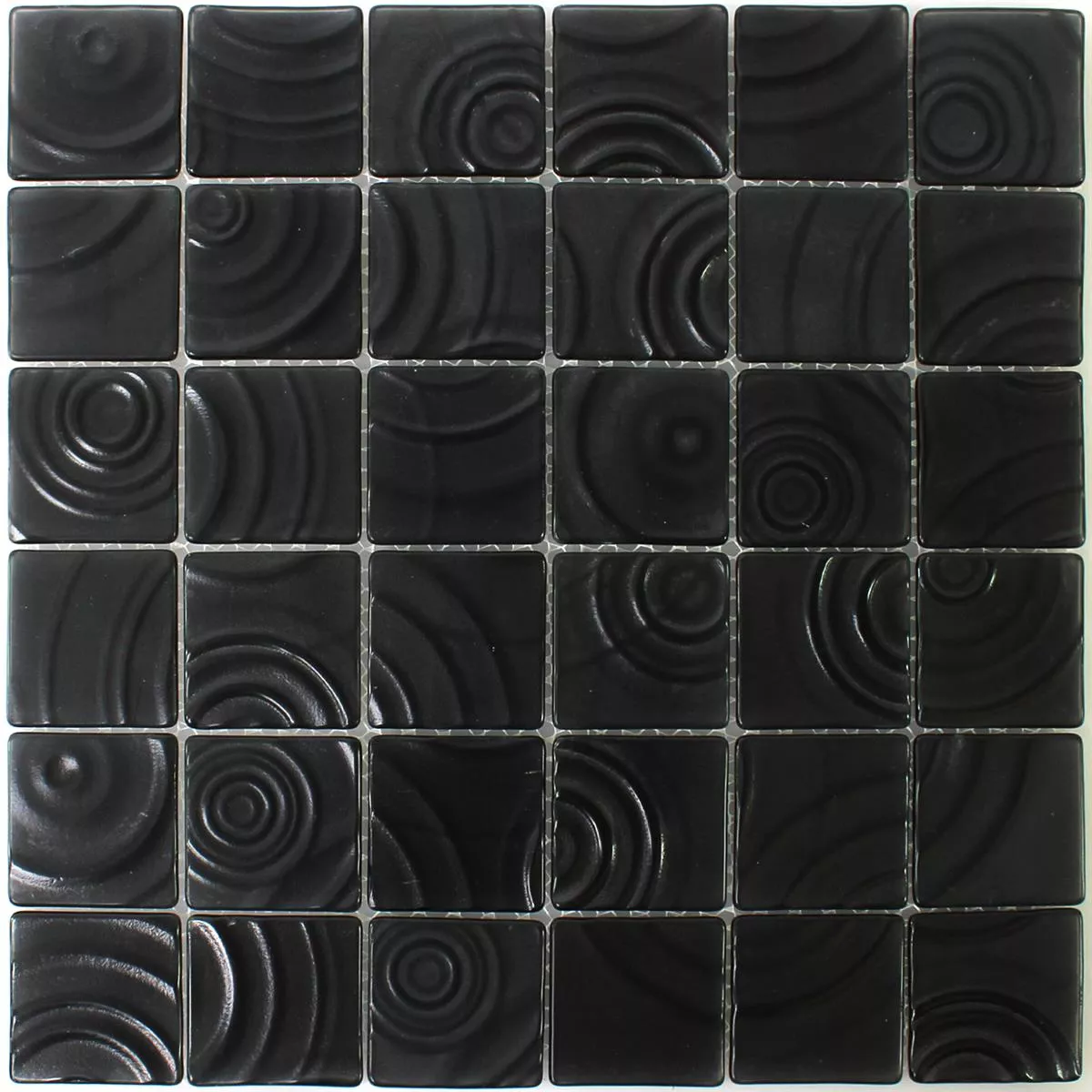 Muster von Glasmosaik Fliesen Kreisel Effekt Schwarz